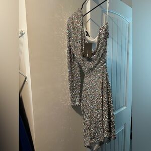 Brand new fashion nova dress. One shoulder and open back.